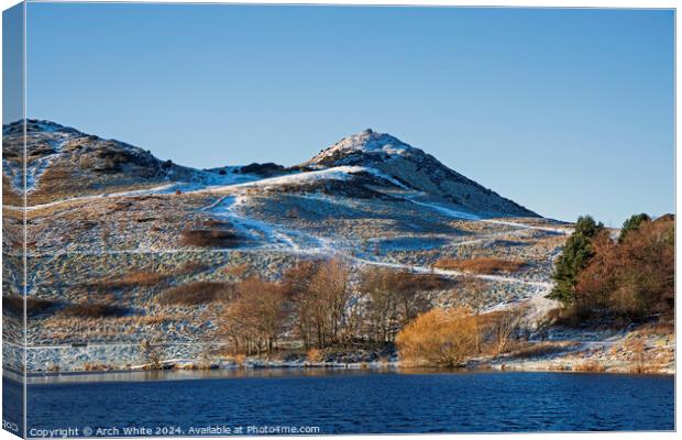 Dunsapie Loch with snow on Arthur's Seat in backgr Canvas Print by Arch White