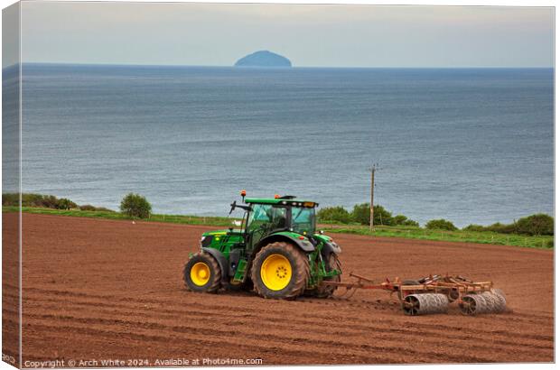 Tractor preparing field for crop planting, Ayrshir Canvas Print by Arch White