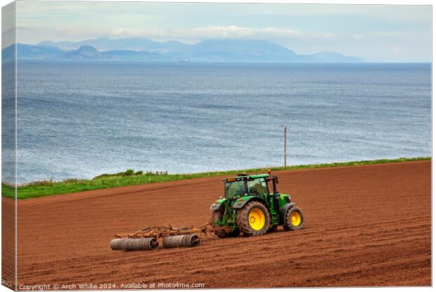 Tractor preparing field for crop planting, Ayrshir Canvas Print by Arch White