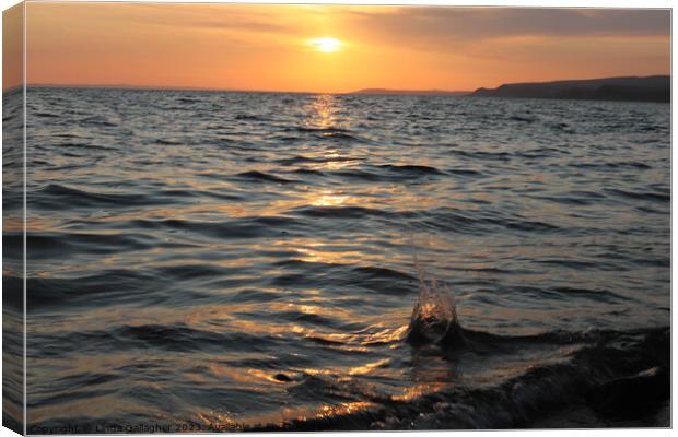 sunset at sea Canvas Print by Linda Gallagher