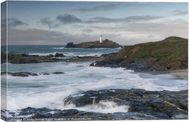 Guardian of the Tides: Godrevy's Dance with the Approaching Stor Canvas Print by Andy Durnin