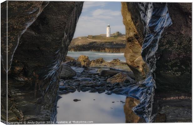 Godrevy's Glimpse: Lighthouse Beyond the Rocky Portal Canvas Print by Andy Durnin
