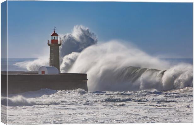 Storm waves over the Lighthouse Canvas Print by Olga Peddi