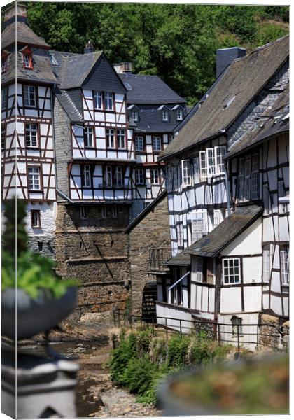 Medieval fachwerk houses in Monschau Old town, Ger Canvas Print by Olga Peddi