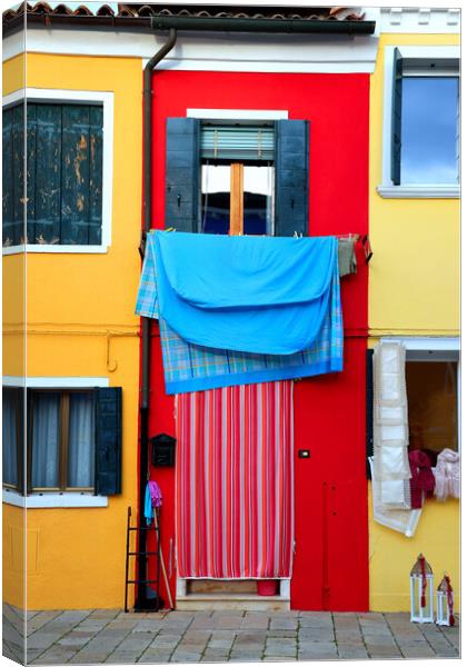 Beautiful colorful houses of Burano, Venice, Italy Canvas Print by Olga Peddi