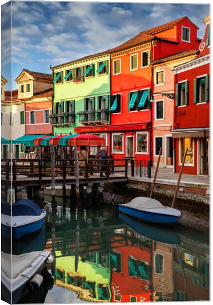 Colorful houses and canal on Burano island, near V Canvas Print by Olga Peddi