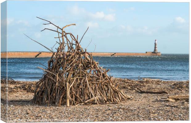 Driftwood stack on Roker beach  Canvas Print by Bryan Attewell