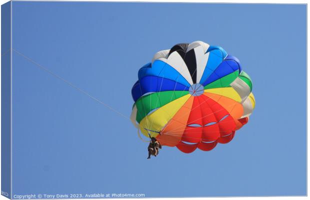 Parachute on a clear blue sky Canvas Print by Tony Davis
