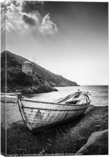 Abandoned Boat by the Greek Seaside Canvas Print by Costas Kalamaras