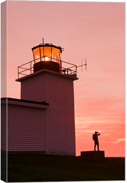 hiker looking out from Grand Passage lighthouse Canvas Print by Dave Reede