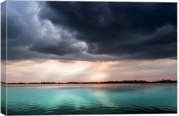 Turquoise lake under the cloudy sky Canvas Print by Dejan Travica