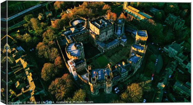 Aerial view of a majestic Lancaster castle surrounded by lush trees during golden hour, showcasing the historic architecture and scenic landscape. Canvas Print by Man And Life