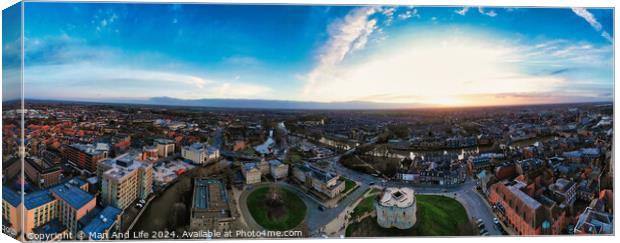 Panoramic aerial view of a city at sunset with dramatic sky and urban landscape in York, North Yorkshire Canvas Print by Man And Life
