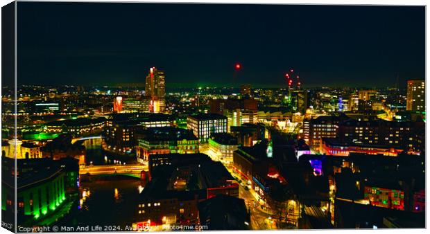 City skyline at night with illuminated buildings and vibrant urban lights in Leeds, UK. Canvas Print by Man And Life