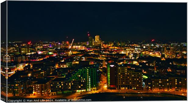 Panoramic night view of a vibrant cityscape with illuminated buildings and streets in Leeds, UK. Canvas Print by Man And Life
