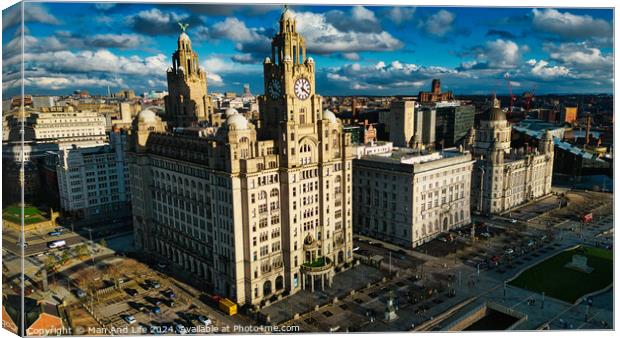 Aerial view of historic urban architecture with iconic buildings under a cloudy sky in Liverpool, UK. Canvas Print by Man And Life