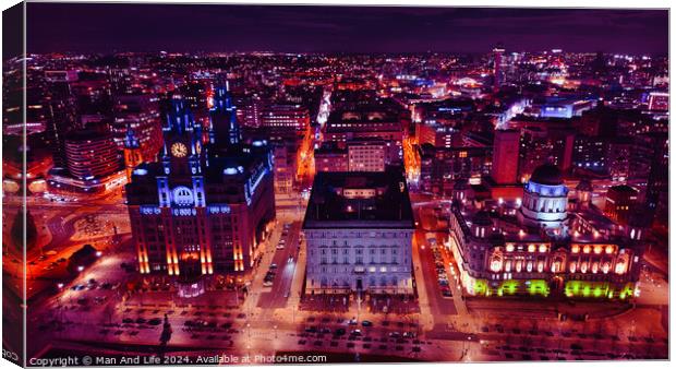 Aerial night view of a vibrant cityscape with illuminated buildings and streets in Liverpool, UK. Canvas Print by Man And Life