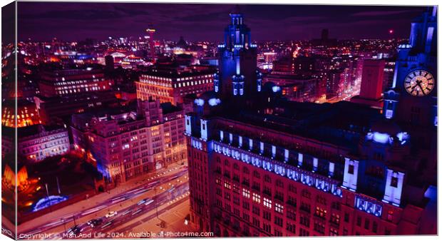 Aerial night view of a vibrant cityscape with illuminated buildings and streets in Liverpool, UK. Canvas Print by Man And Life