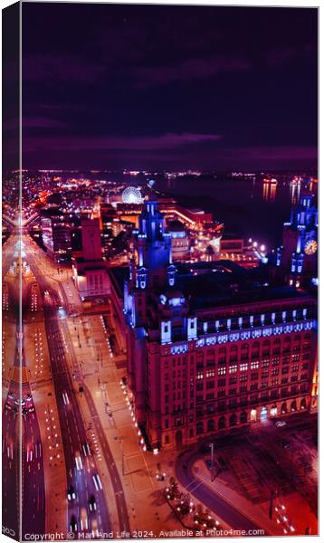 Aerial night view of a cityscape with illuminated streets and buildings, showcasing urban architecture in Liverpool, UK. Canvas Print by Man And Life