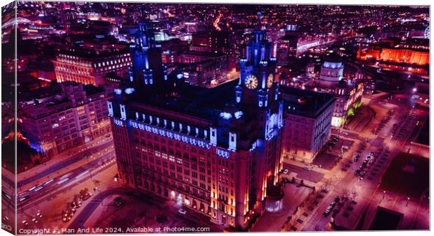 Aerial night view of an illuminated urban cityscape with historic architecture in Liverpool, UK. Canvas Print by Man And Life