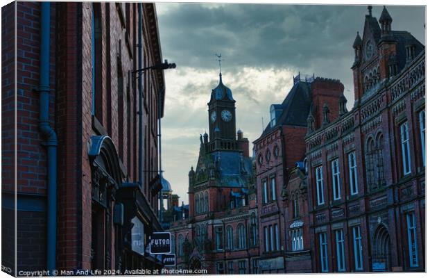 Historic European cityscape with clock tower at dusk, moody sky, and vintage architecture in York, UK. Canvas Print by Man And Life