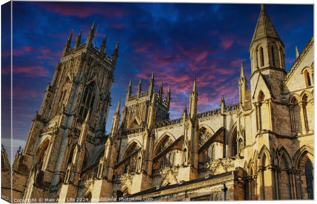 Majestic medieval cathedral against a vibrant sunset sky in York, UK. Canvas Print by Man And Life