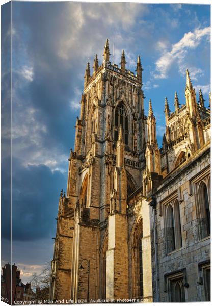Gothic cathedral against a dramatic sky at sunset in York, UK. Canvas Print by Man And Life