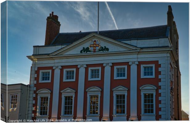 Classic red and white building facade with clear blue sky at dusk in York, UK. Canvas Print by Man And Life