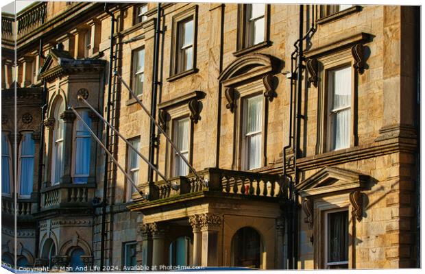 Sunlit classic European architecture with ornate facades and windows in Harrogate, England. Canvas Print by Man And Life