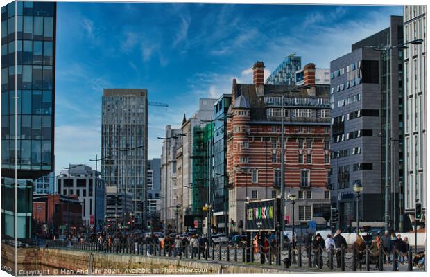 Modern cityscape with diverse architecture and pedestrians on a sunny day in Liverpool, UK. Canvas Print by Man And Life