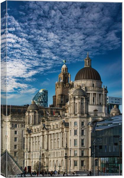 Dramatic sky over historic city buildings with intricate architecture in Liverpool, UK. Canvas Print by Man And Life