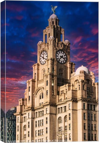 Liver Building in Liverpool, UK against a dramatic sunset sky Canvas Print by Man And Life