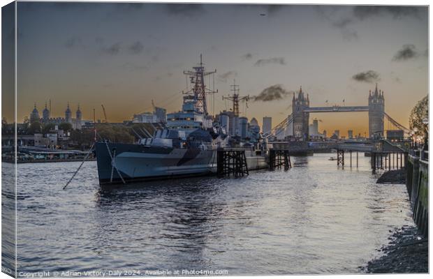 HMS Belfast, moored by Tower Bridge, London Canvas Print by Adrian Victory-Daly