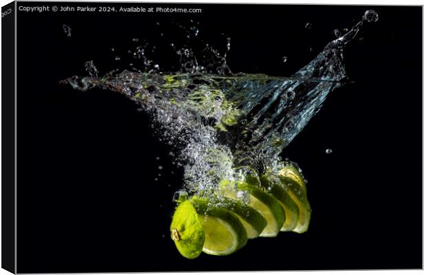Splash Sliced Lime Canvas Print by John Parker