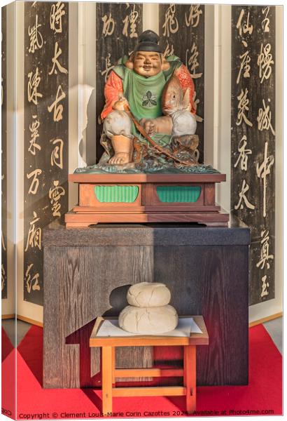 Wooden statue of Ebisu above a kagami-mochi rice cake. Canvas Print by Clement Louis-Marie Corin Cazottes