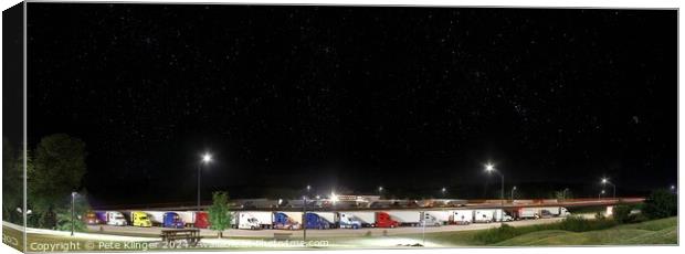 Night Rest, clear night sky, with stars, over transporters lined up, parked Canvas Print by Pete Klinger