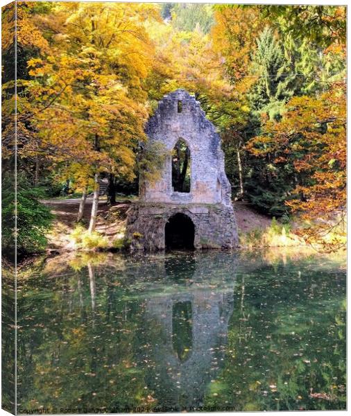 Artificial chapel ruin on pond Canvas Print by Robert Galvin-Oliphant