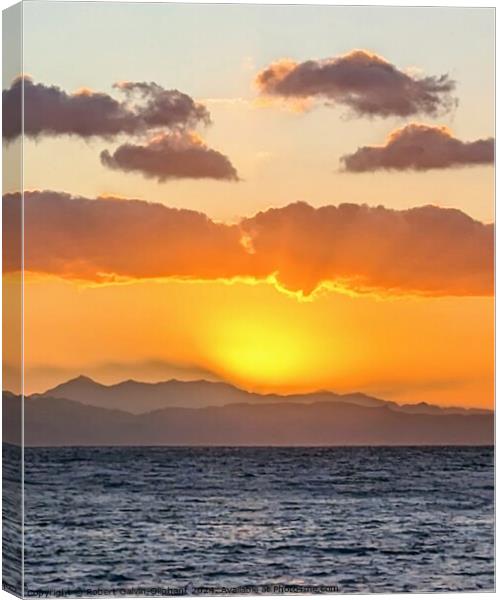 Brilliant sunrise on sea Canvas Print by Robert Galvin-Oliphant