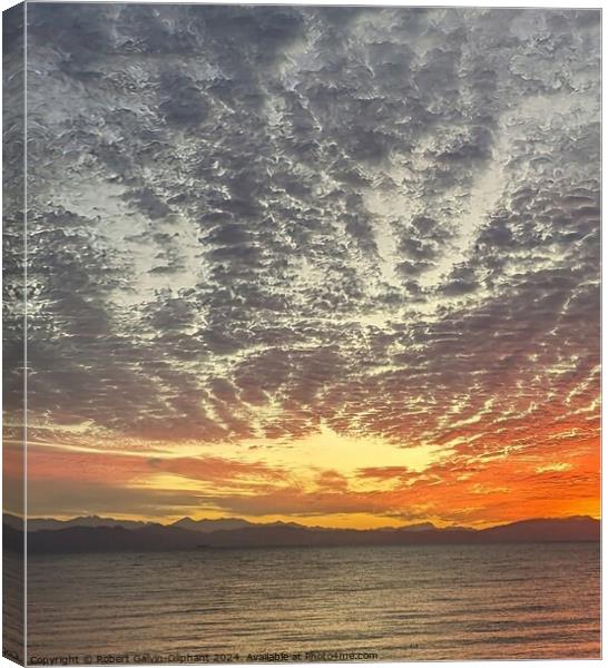 Spectacular clouds over sea Canvas Print by Robert Galvin-Oliphant