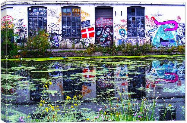 Hackney Canal And Grafitti London Canvas Print by val butcher