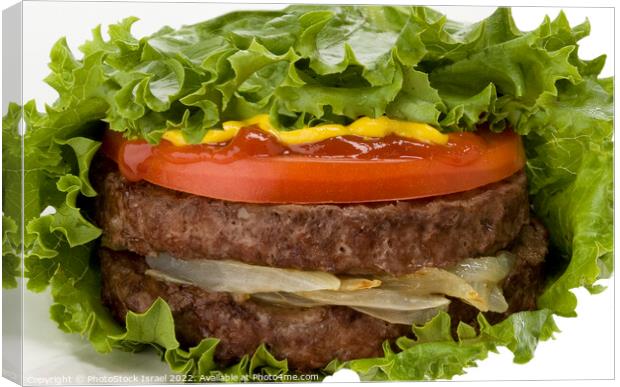 Double Burger in lettuce Canvas Print by PhotoStock Israel