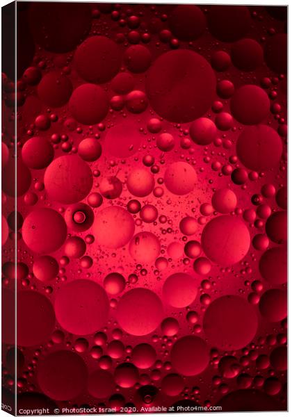 Red 'moon craters' ball Canvas Print by PhotoStock Israel
