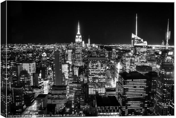 New York Empire State Building Night Life Black and White Canvas Print by mick gibbons