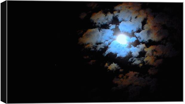 moon in the clouds Canvas Print by david hopson