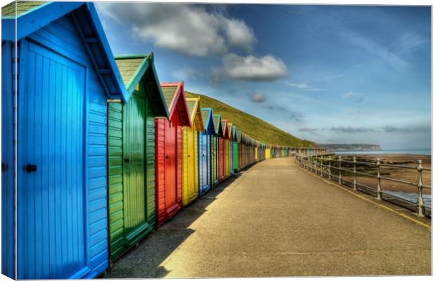 Whitby Beach Huts Canvas Print by Sarah Couzens