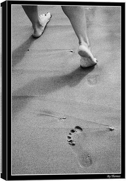 Foot Prints On Sand Canvas Print by Toma Mihai Ioan