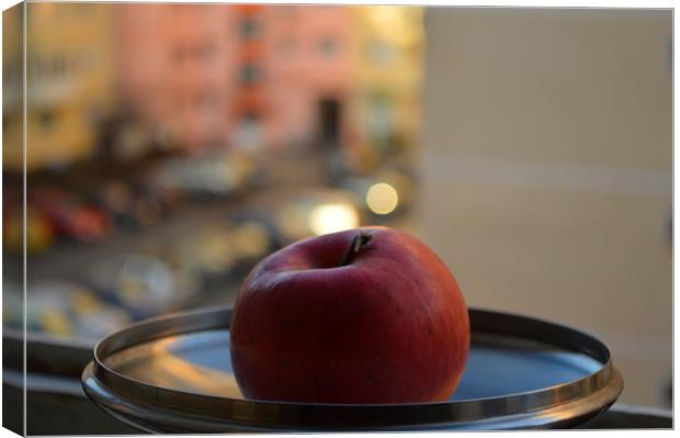 Red apple on a tray Canvas Print by Adrian Bud