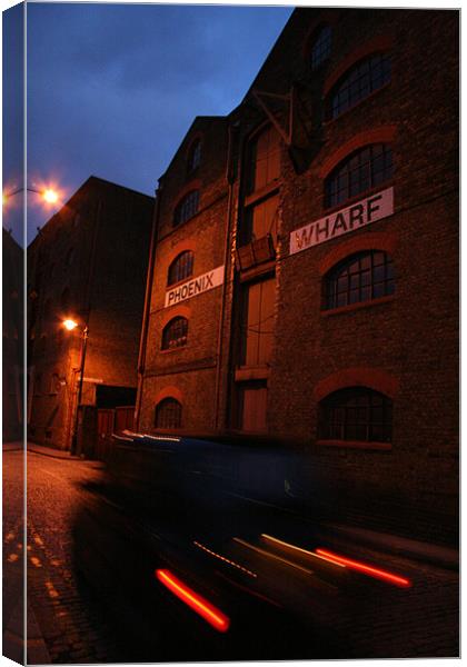 Wapping Taxi Blur Canvas Print by mark blower