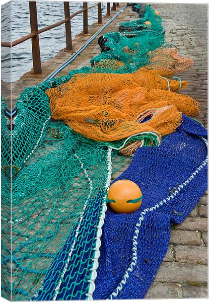 Fishing Nets by the Harbour Canvas Print by Jacqi Elmslie