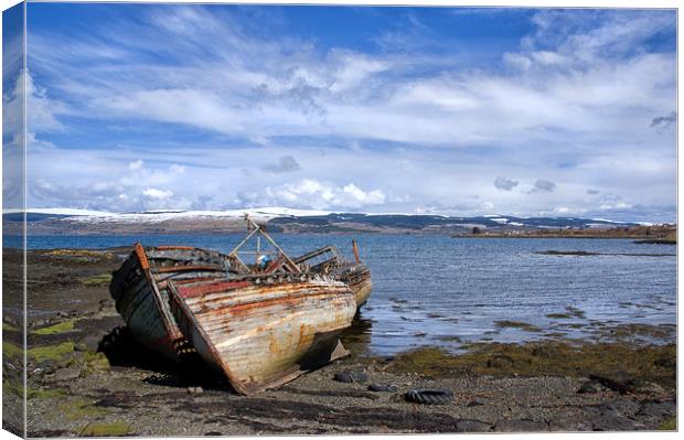 Old Boats on Mull Canvas Print by Jacqi Elmslie